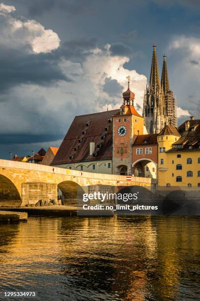 dramatic sky over regensburg old town - regensburg stock pictures, royalty-free photos & images