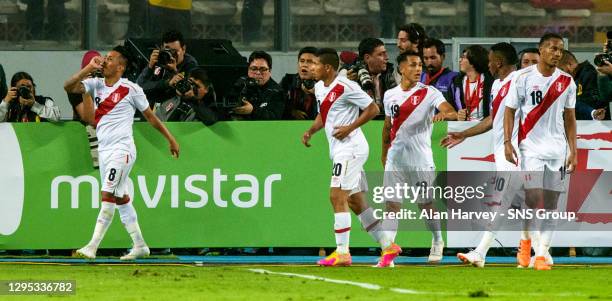 V SCOTLAND .ESTADIO NACIONAL DE LIMA - PERU.Peru's Christian Cueva wheels away after opening the scoring.