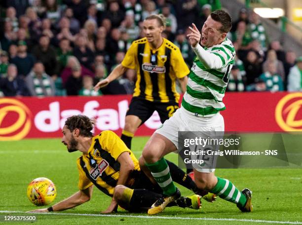 V AEK ATHENS.CELTIC PARK - GLASGOW .Celtic's Callum McGregor and AEK Athen's Marios Oikonomou