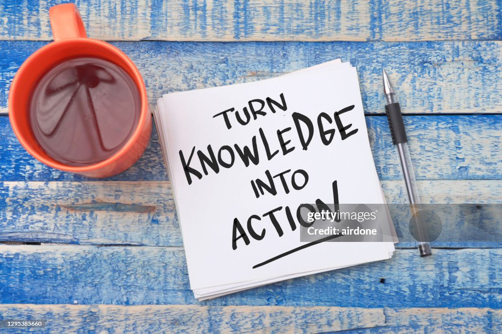 Turn knowledge into action, text words typography written on book, life and business motivational inspirational concept