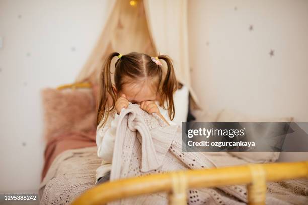 crying little girl in bed - child fear stock pictures, royalty-free photos & images