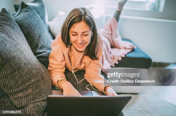 girl homeschooling - virtual tutoring children stock pictures, royalty-free photos & images