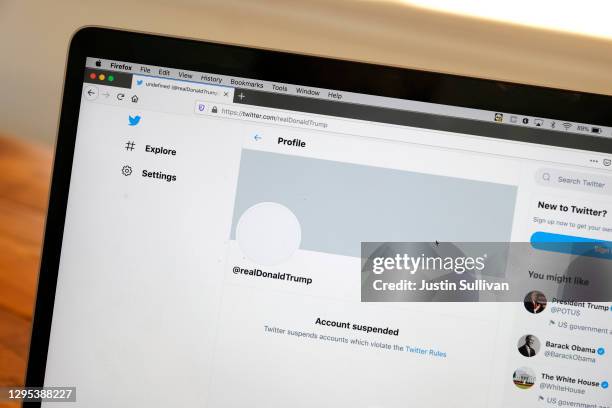 The suspended Twitter account of U.S. President Donald Trump appears on a laptop screen on January 08, 2021 in San Anselmo, California. Citing the...