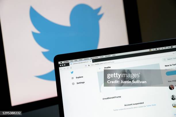 The suspended Twitter account of U.S. President Donald Trump appears on a laptop screen on January 08, 2021 in San Anselmo, California. Citing the...
