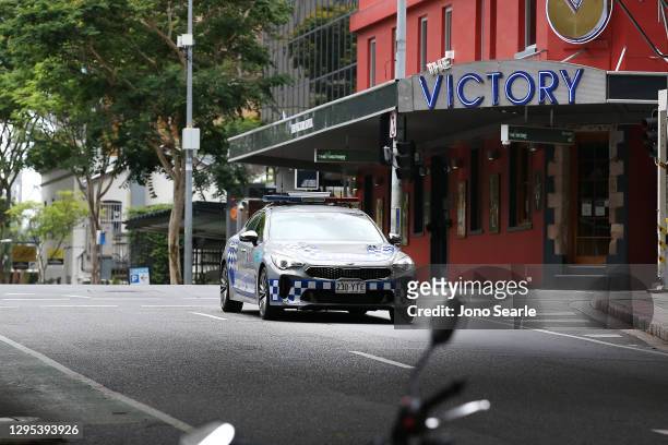 Police car patrols a local street on January 09, 2021 in Brisbane, Australia. According to reports, Queensland has recorded no new cases of...