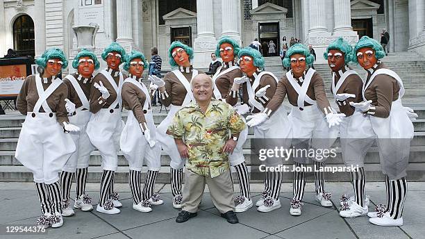 Rusty Goffe, who starred in the 1971 version of the film, and the Oompa Loompas hand out Golden Tickets for the "40th Anniversary of Willy Wonka &...