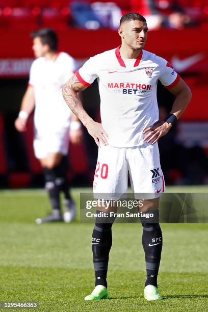 Diego Carlos of Sevilla reacts after conceding an own goal during the La Liga Santander match between Sevilla FC and Real Sociedad at Estadio Ramon...