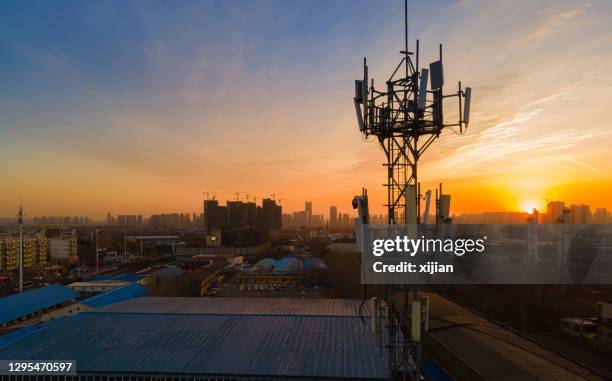 aerial view 5g cellular communications tower - 5g tower stock pictures, royalty-free photos & images