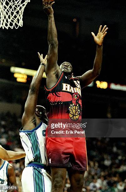 Tyrone Corbin of the Atlanta Hawks lays up a basket in a match between the Atlanta Hawks v Charlotte Hornets in the NBA League played at the...