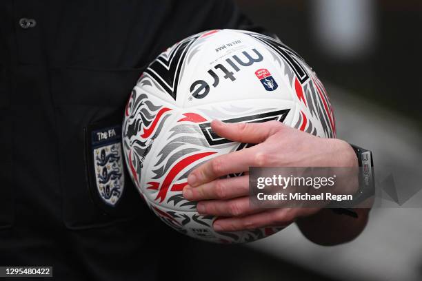 Referee Tony Harrington is seen holding the Mitre Pro Delta FA Cup Match Ball prior to the FA Cup Third Round match between Norwich City and Coventry...