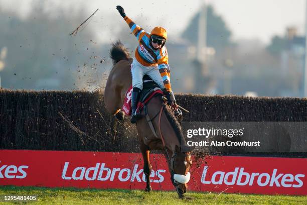 Harry Cobden riding Master Tommytucker smash through the last fence but remain upright to win The Ladbrokes Silviniaco Conti Chase at Kempton Park...