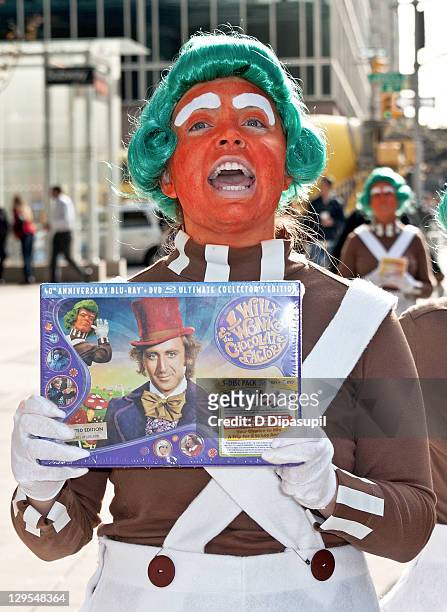 Oompa Loompas hand out Golden Tickets for the "40th Anniversary of Willy Wonka & The Chocolate Factory" event on October 18, 2011 in New York City.