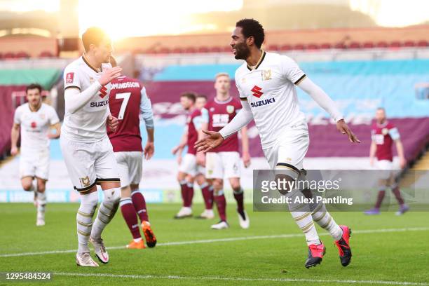 Cameron Jerome of MK Dons celebrates after scoring their team's first goal during the FA Cup Third Round match between Burnley and Milton Keynes Dons...