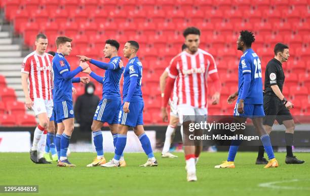 James Justin of Leicester City celebrates with teammates Harvey Barnes and Youri Tielemans after scoring his team's first goal during the FA Cup...