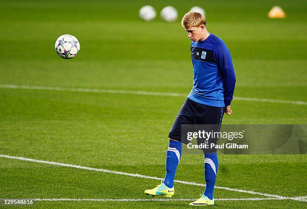 Kevin De Bruyne of KRC Genk warms up during a KRC Genk training session ahead of the UEFA Champions League Group E match against Chelsea at Stamford...