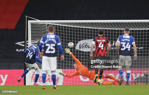 Dylan Bahamboula of Oldham Athletic scores his team's first goal from the penalty spot during the FA Cup Third Round match between Oldham Athletic...