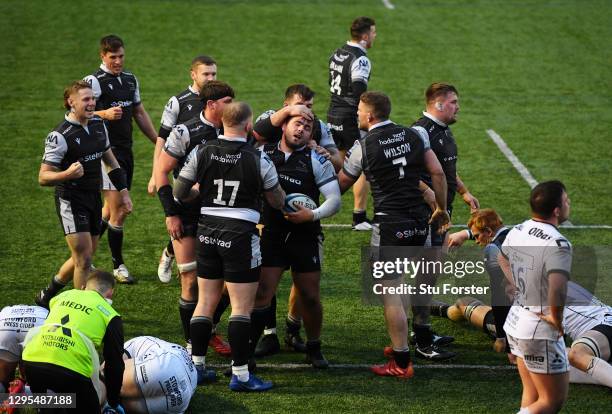 George McGuigan of Newcastle Falcons celebrates scoring his sides third try with Adam Brocklebank and Mark Wilson during the Gallagher Premiership...