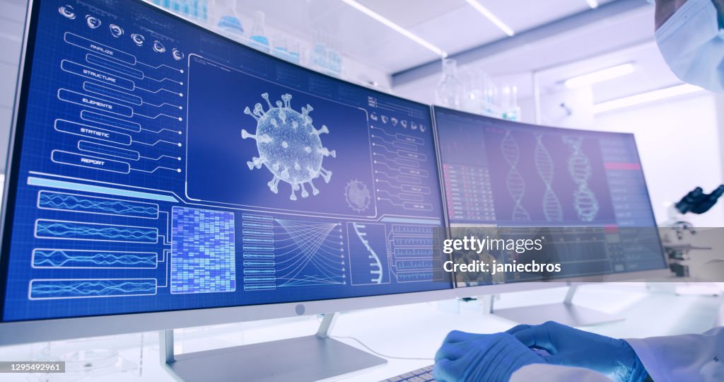 Equipo de laboratorio futurista - pruebas de coronavirus. Vista lateral del científico