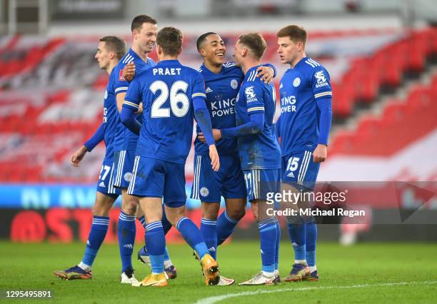 Marc Albrighton of Leicester City celebrates with teammates Jonny Evans, Dennis Praet, Youri Tielemans, and Harvey Barnes after scoring his team's...