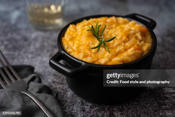 homemade pumpkin risotto - risotto stock-fotos und bilder