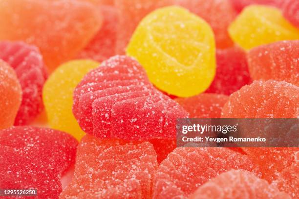 jelly candies background - red jelly stock pictures, royalty-free photos & images