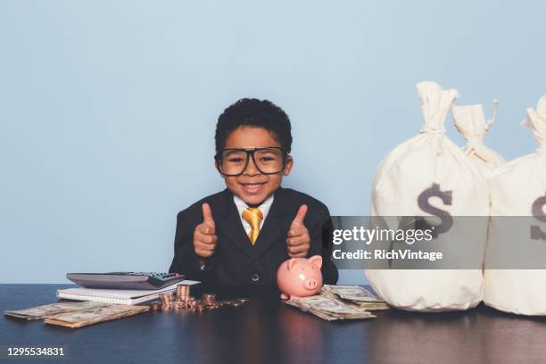 young business boy making money - kids making money stock pictures, royalty-free photos & images