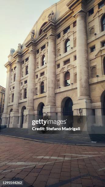 business square in milan, historical financial and economic building - borsa stock pictures, royalty-free photos & images