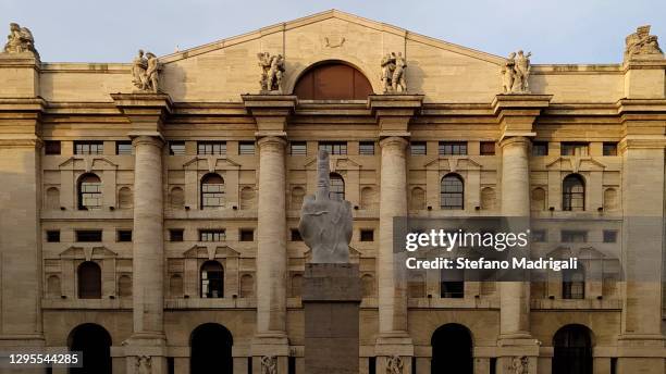 view of the milan stock exchange's square, historical financial and economic building - borsa stock pictures, royalty-free photos & images