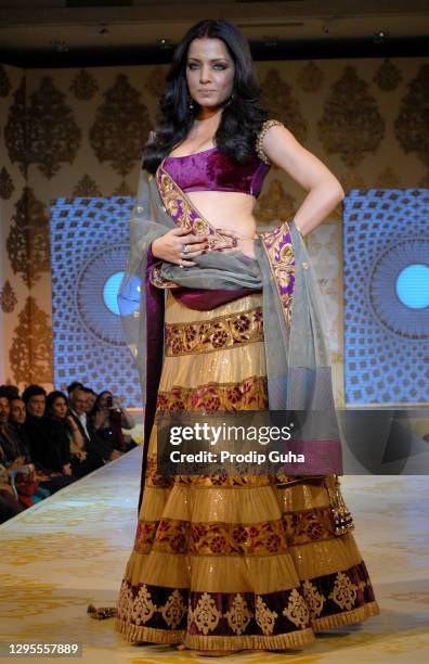 Celina Jaitly walks the ramp for designer Manish Malhotra's creation at the fundraising fashion show 'Mijwan' on January 23, 2011 in Mumbai, India.