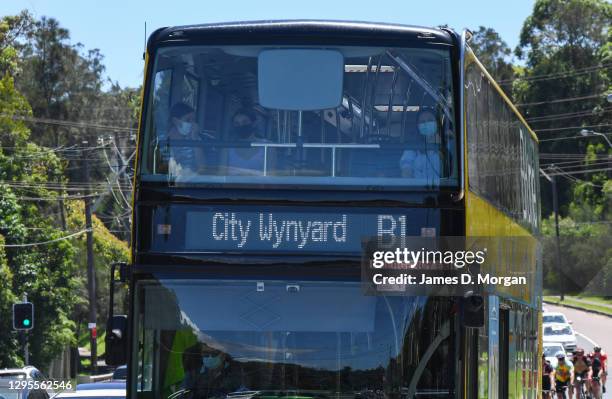 People wearing face masks on the top deck of the B1 Northern Beaches bus into Sydney's Wynyard area on January 10, 2021 in Sydney, Australia. From...