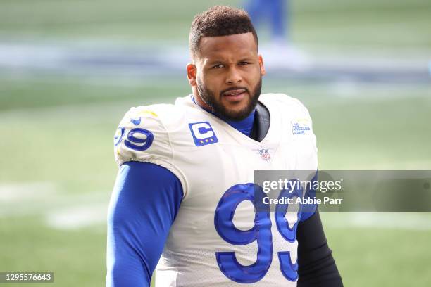 Aaron Donald of the Los Angeles Rams looks on the NFC Wild Card Playoff game against the Seattle Seahawks at Lumen Field on January 09, 2021 in...