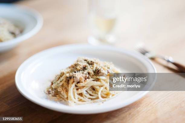 spaghetti with sardines and fennel seeds - kamakura city stock pictures, royalty-free photos & images