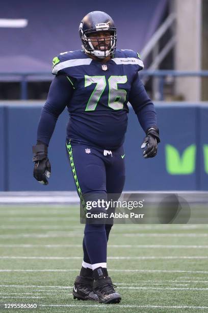 Duane Brown of the Seattle Seahawks looks on in the second quarter against the Los Angeles Rams during the NFC Wild Card Playoff game at Lumen Field...