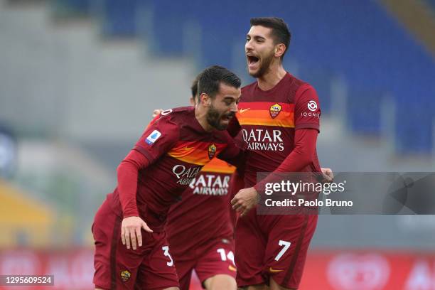 Lorenzo Pellegrini of Roma celebrates with team mate Leonardo Spinazzola after scoring their sides first goal during the Serie A match between AS...