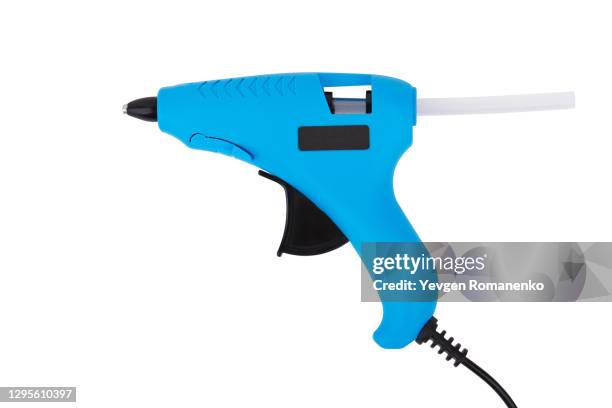 glue gun isolated on white background - silikone stock pictures, royalty-free photos & images