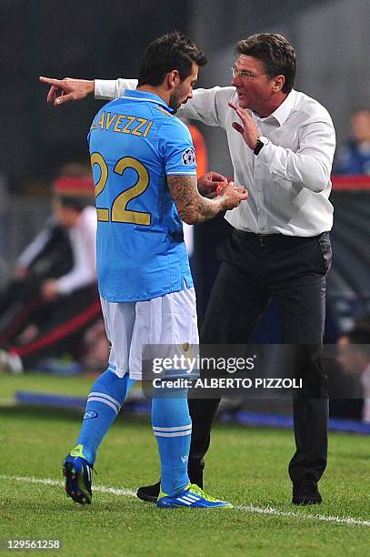 Napoli's coach Walter Mazzarri gives instructions to Napoli's Argentine forward Ezequiel Ivan Lavezzi during their group A Champions League football...