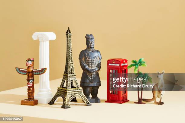 a group of travel souvenirs - souvenirs stock-fotos und bilder