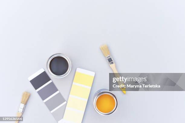 tins of paint in trendy color with brushes and color palette. - gray color swatches stock pictures, royalty-free photos & images