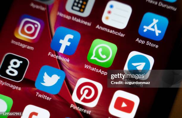 social media apps like whatsapp, facebook, twitter, instagram and some other apps on the screen of an iphone xr - whatsapp stock pictures, royalty-free photos & images
