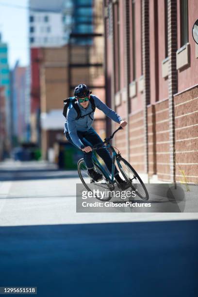 city bicycle commuter - taking a corner stock pictures, royalty-free photos & images