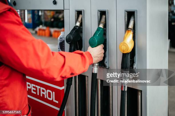 gas station work - diesel imagens e fotografias de stock