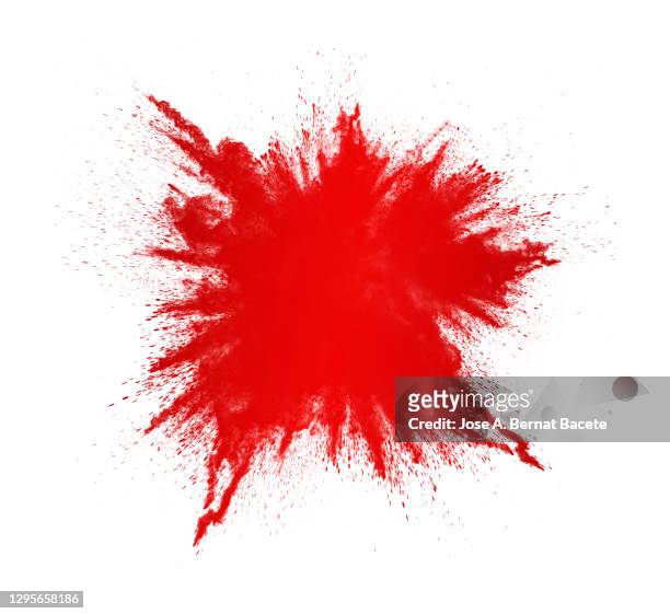 explosion by an impact of a cloud of particles of powder of red color on a white background. - colourful studio shots stock-fotos und bilder