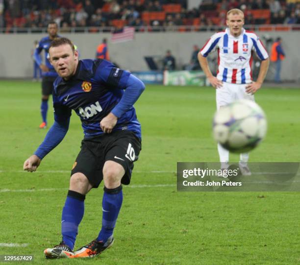 Wayne Rooney of Manchester United scores their second goal during the UEFA Champions League Group C match between Otelul Galati and Manchester United...