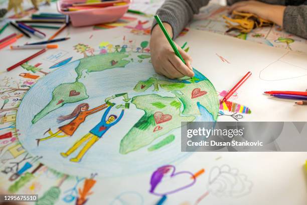 creative kids drawing on paper - drawing artist cartoon stock pictures, royalty-free photos & images
