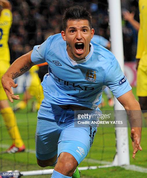 Manchester City's Argentinian forward Sergio Agüero celebrates after scoring the winning goal during the UEFA Champions league football match between...
