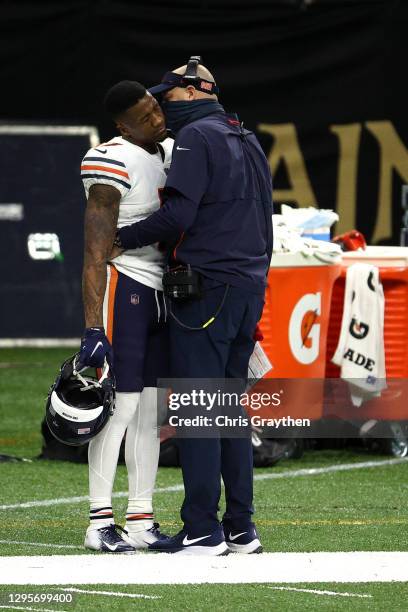 Anthony Miller of the Chicago Bears talks with head coach Matt Nagy after being ejected from the game on a penalty of Unsportsmanlike Conduct because...