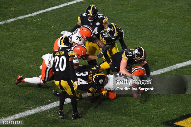 Kareem Hunt of the Cleveland Browns scores a touchdown during the first half of the AFC Wild Card Playoff game against the Pittsburgh Steelersat...