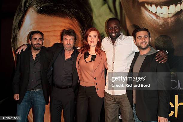 Director Eric Toledano, actors Francois Cluzet, Audrey Fleurot and Omar Sy and director Olivier Nakache attend the Paris premiere of 'Intouchables'...