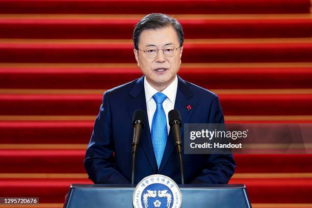 In this handout image provided by South Korean Presidential Blue House, South Korean President Moon Jae-in speaks during his New Year's speech at the...