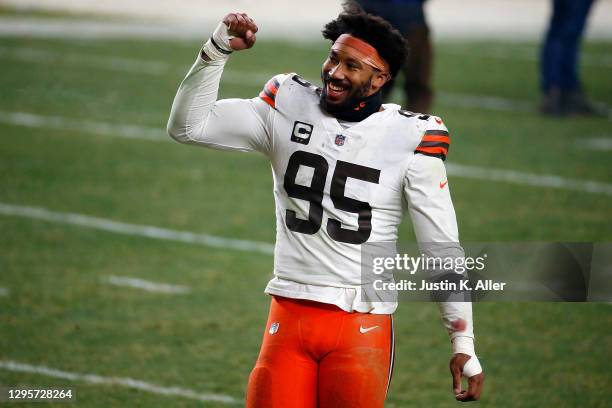 Myles Garrett of the Cleveland Browns celebrates a victory over the Pittsburgh Steelers in the AFC Wild Card Playoff game at Heinz Field on January...